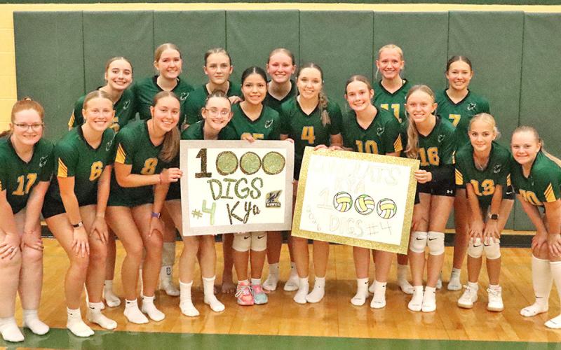 (Photo by Scott Bidroski) It’s all smiles for the Hawk Volleyball team following their win over Bayard and the reaching of the 1,000 dig milestone by senior Kya Binger. Binger collected 8 digs to surpass the monumental defensive statistic.