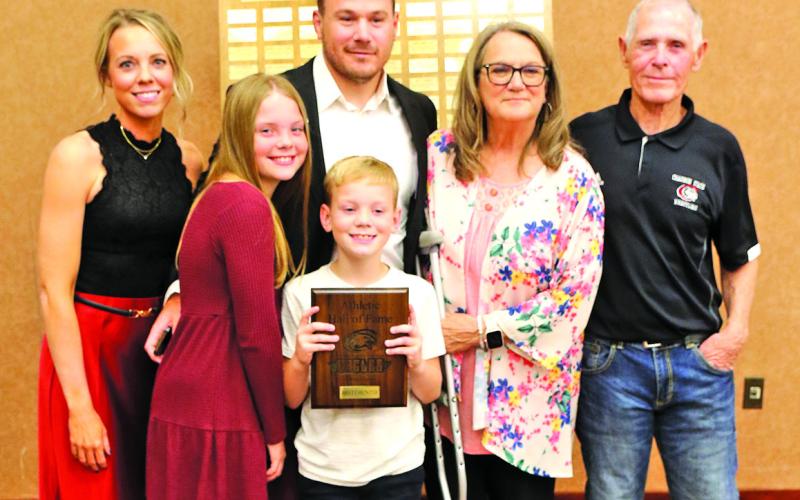 Photo by Con Marshall Brett Hunter is shown with his wife, Ashley, their children, Paisley and Jax, and his parents, Roger and Elizabeth, on Saturday, October 5, when he was inducted into the Chadron State Athletic Hall of Fame.