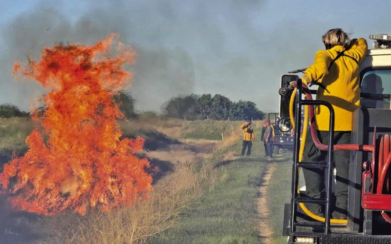 Courtesy Photo Earlier this month, the Hay Springs Volunteer Fire Department oversaw the burning of tumbleweeds in a water canal south of Hay Springs. This volunteer group, which does so much for the community, is being honored at the 2024 Friendly Festival as the Grand Marshal.