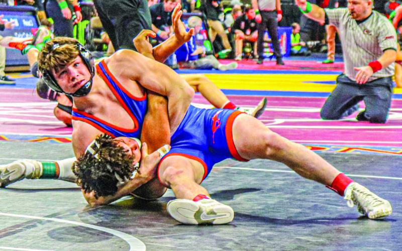 Photo by Blake Peterson Junior Kyler Vincent picked up career win #100 and his second medal during the 2024 NSAA State Wrestling tournament this past weekend, February 15-17.