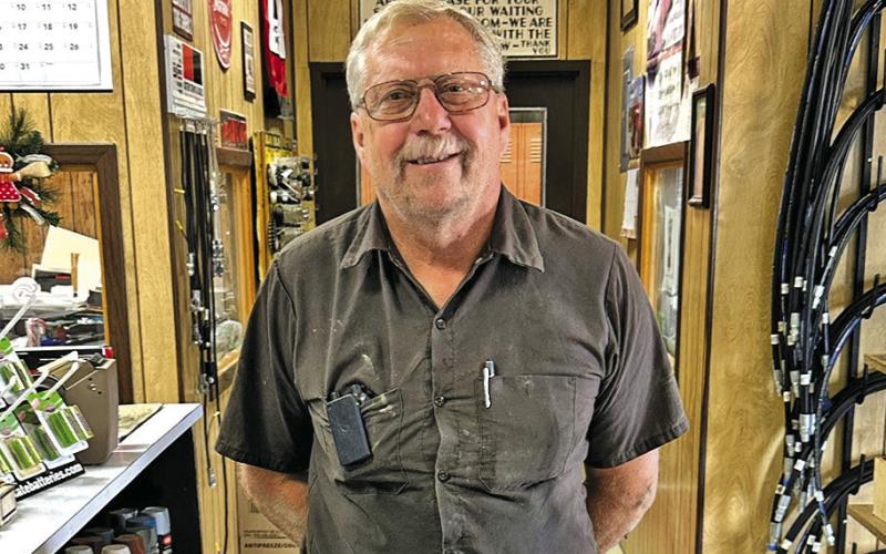 (Photo by Scott Bidroski) Rex Retzlaff was chosen as the 2025 Sheridan County Fair &amp;amp; Rodeo Good Neighbor. Retzlaff, pictured here at his job at Frontier Service and Supply in Rushville, was recognized for his many years of dedication to his community.