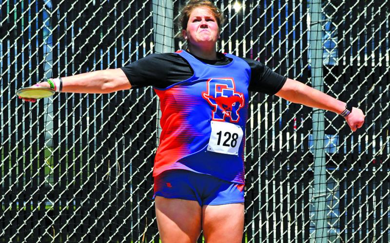 Photo by Melissa Grover Senior McKinley Grover lets it fly during the Discus event. Grover would earn a medal with a fifth place finish on Friday, May 19 at the Nebraska State Track Meet in Omaha, Neb.