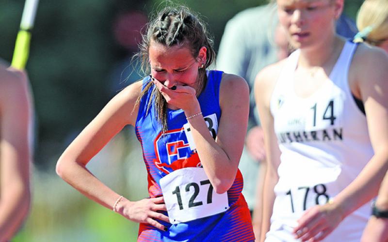 Photo by Jeremy Buss, Jeremy Buss Photography The emotion overcomes senior Tyrah American Horse as she finished the 1600 meter race at the Nebraska State Track Meet on Saturday, May 18. American Horse would place seventh and set the Gordon-Rushville High School record in the event, posting a time of 5:30.03.