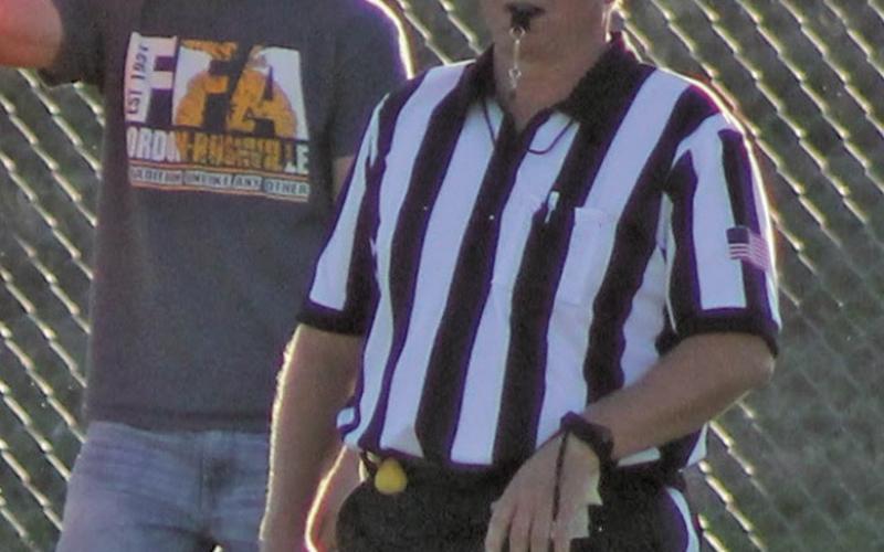 Photo by Heidi Beguin Rushville resident Rex Beguin works a game recently for Gordon-Rushville Public Schools. Beguin has put the cap on an amazing 40 year career officiating football across multiple levels.