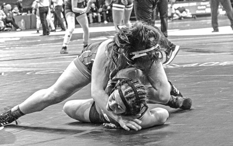 Sophomore Lainey Filmore battles for position with her opponent on Thursday, February 15 in Omaha. Filmore became the first Mustang in school history to compete at the NSAA State Championships in Omaha. Photo by Blake Peterson