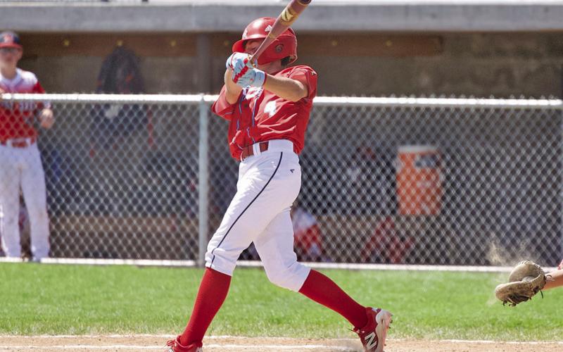 (Photo by Richae Malara) Eighth grader Khai Janssen takes a swing during the Gering Tournament this past weekend. Janssen and the Regulators finished in third place out of the five teams over the weekend.