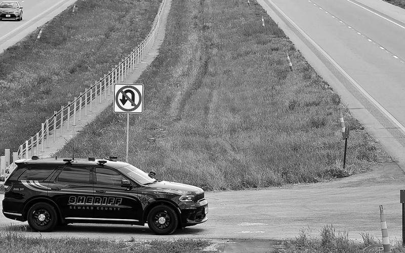 Photo by Eric Gregory for the Flatwater Free Press A Seward County Deputy monitors eastbound traffic on Interstate 80 in May 2023. Seward County’s 24-mile stretch of I-80 has become known, and notorious, for a type of traffic stop that the county has used to seize millions from motorists. Sen. Tom Brewer is now working to ban the practice, known as civil asset forfeiture.