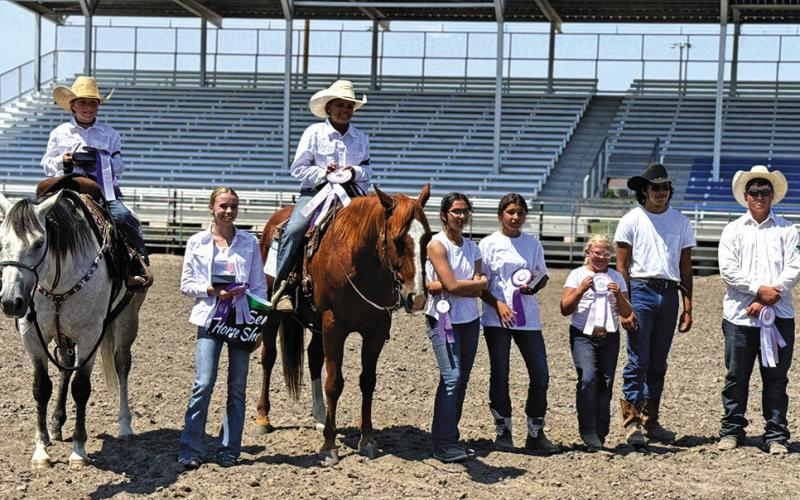 Photo by Courtney Ostrander The winners from the Sheridan County 4-H Horse Show show off the ribbons following their competition on Saturday, July 13.