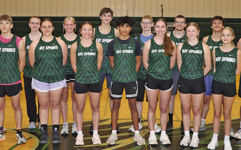2026 Hay Springs Track and Field team. Front row: (L-R) Grant Wellnitz, Kinley Tausan, Alaina Raymer, Arian Mata, Megan Anderson, Reese Varvel, and Tabby Schiaffo. Back row: (L-R) Luke Edwards, Dutch Weaver, Emily Forney, Riggen Binger, Gage Didier, Mason Albrecht, Parker Wellnitz, and Duke Turman. Not pictured: Easton Mintken, Evan Smith, Bailey Hankins, Emma Albrecht, and Jacob Dorshorst. Photo by Scott Bidroski
