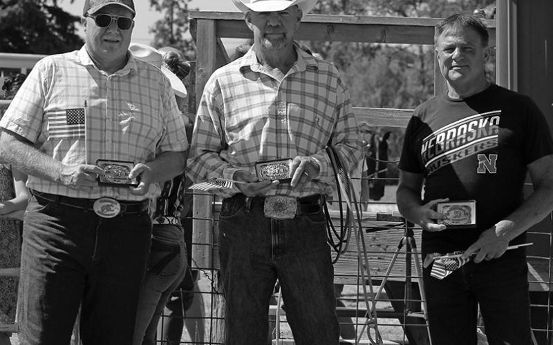 Photo by Heidi Beguin Rex Beguin, Kirk Beguin, and Chuck Hinn were honored by the Rushville Roping Club for all their years of dedication to the Fun Days Rodeo.