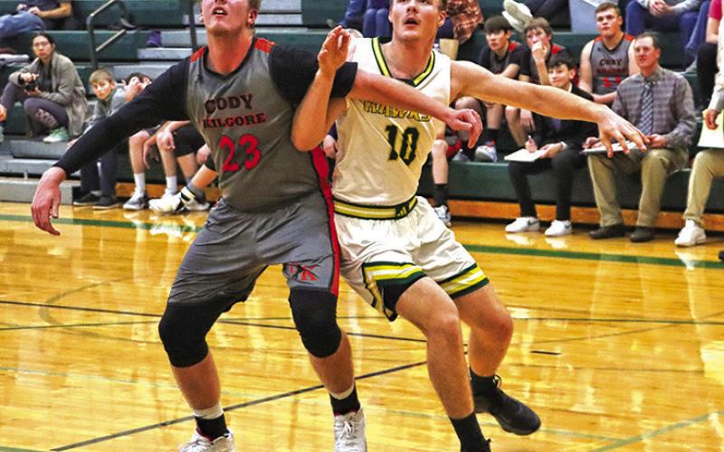 Photo by Scott Bidroski Senior Jordyn Anderson vies for position for a rebound against Cody-Kilgore. Anderson played a career 49 games for the Hawks and collected 175 career rebounds.
