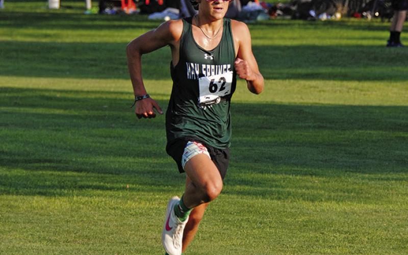 Photo by Chris Heiser Junior Parker Wellnitz pushes for the finish in Scottsbluff. Wellnitz would finish sixth overall in the race.