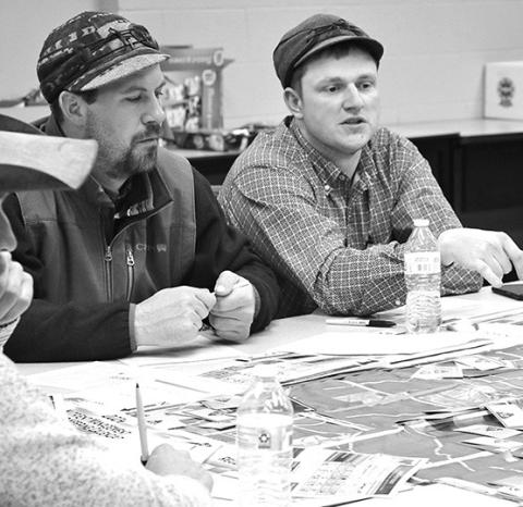Photo by Chabella Guzman Figuring out the best manure application plan for their fields are Sam Cares, left, and Lance Chandler at the recent Nebraska Extension “Manure Better” with land application training.