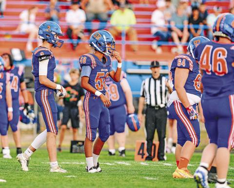 Photo by Morgan Meisenheimer The Gordon-Rushville defense lines up for a play earlier in the 2025 season. The Mustangs fell this week to Hershey but will look to bounce back on Friday against Valentine.