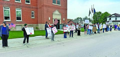 Photo by Scott Bidroski Around 40 citizens came out to peacefully protest on Saturday, June 14 in Rushville. The group was part of the nationwide demonstrations under the title of ‘No Kings.’