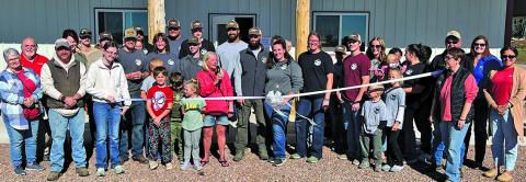Courtesy Photo Wyatt Family Meats, located north of Hay Springs, cuts the ribbon at their Open House on Saturday, Oct. 17. The business welcomed in 800+ guests for the event.