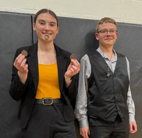 (Courtesy Photo) Claire Wellnitz (left) and Draegon Leonard (right) competed at the District Speech Meet in Maxwell, Neb. on Monday, March 17. Wellnitz just missed a qualification for State with a fourth place finish in Entertainment.