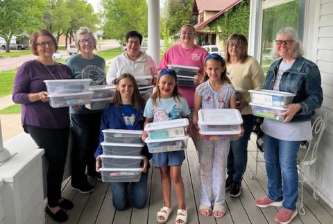 (Courtesy Photo) Members of Delta Kappa Gamma donated grooming kits which were delivered to schools in Gordon, Rushville, Hay Springs, and Chadron during the month of June. Those pictured above include: Front row: (L-R) Gordon-Rushville Public Schools Nurse Ashlei Tausan, Karley Tausan, and Grace Tausan. Back row: (L-R) Jean Hensley, Jolee Nielsen, Kay Kruger, Shayley Kersey, Sandi Muirhead, and Ann Petersen.