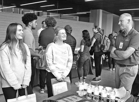 Photo by Erika Pritchard, UNK Communications Robert Dyer, CEO of Cozad Community Health System, meets with health science students Tuesday during the Hospital Partners Networking Event at UNK.