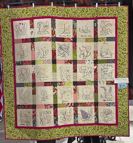 (Courtesy Photo) The finished quilt is proudly displayed with all 25 hand embroidered squares that a group of volunteers in Sheridan County brought back to life in this beautiful quilt.
