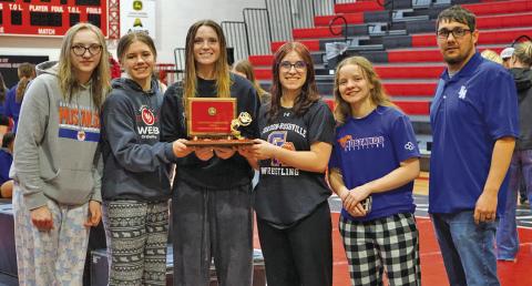 (Photo by Michele Heck) The Gordon-Rushville Wrestling Girls Wrestling team took home the first place trophy from the Ainsworth Tournament on Friday, January 31. Those pictured include: (L-R) Stormy Tesch, Jenifer Banister, Kirsten Heck, Lainey Fillmore, Madyson DeHart-Harris, and Coach Jose Campos.