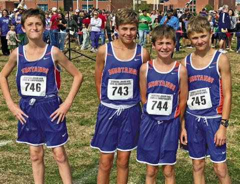 (Photo by Scott Bidroski) The 2025 Gordon-Rushville Middle Schools Boys Cross Country team prepares at the Start Line for the 2025 Nebraska Middle School Championships in Papillion, Neb. on Saturday, October 11. The group includes (L-R) Logan Leonard, Nixon Banks, Braxton Bidroski, and Cordell Dehning.