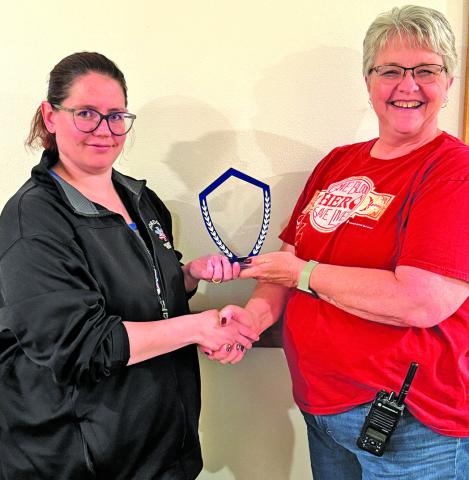 Courtesy Photo Cynthia Vinton (left) receives the 2024 Responder of the Year award from Rescue Squad Chief Marchelle Paul at a recent meeting. Vinton joined the squad in the fall of 2023. See the full story on Page 3!