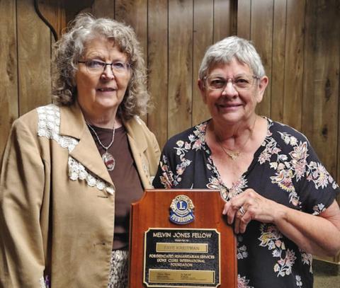 Courtesy Photo Nancy Russell (left) presented the Melvin Jones Fellow Award to Faye Kreitman (right). Kreitman was also installed as the new Lions Club President at the June 10 meeting.