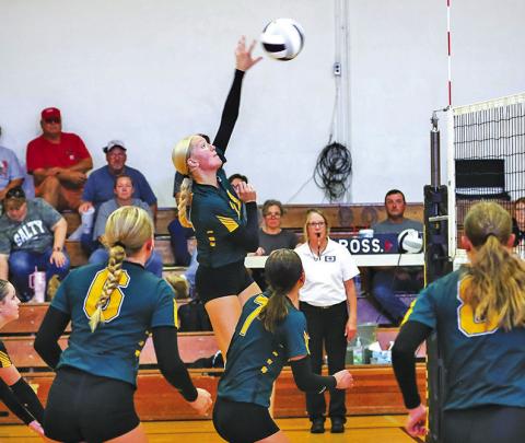 Photo by Megan Andersen Hooker County Tribune Junior Emily Forney fires a shot during an earlier match in 2026. Forney and the Hawks are on a roll following two season opening losses as the group won all five matches they played this past week.