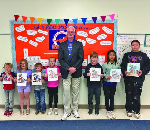 Courtesy Photo Rushville Elementary celebrated Arbor Day and the winners showed off their creations with RES Principal Keith Mills.