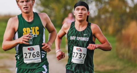 (Photo by Cassie Banks) Senior Parker Wellnitz cruises during the Class D-6 District race on Thursday, October 16. The senior made it four in a row, finishing in sixth place to qualify for State XC in Kearney on October 24.