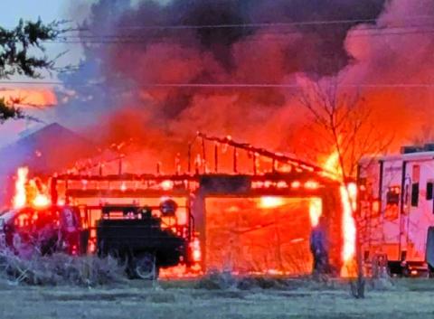 Courtesy Photo The property at 506 Sprague St. in Rushville was the site of a fire on Thursday, April 4. The garage, which is the structure in the front of the photo, was a complete loss but the first responders were able to limit damages to neighboring buildings and the main house.