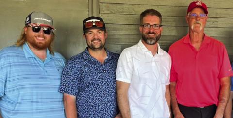Courtesy Photo CARE Tournament Men’s Division winners (L-R) Will Wacker, Rob Doyle, David Morris, and Keith Mills.