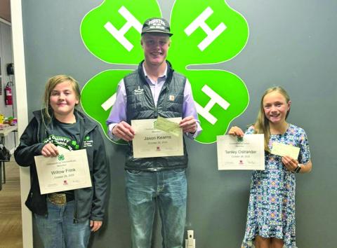 Courtesy Photo Outstanding Members of the Year were chosen at the 4-H Achievement Banquet. Willow Frink, Jaxon Kearns, and Tenley Ostrander were recognized in their respective age groups for their hard work.