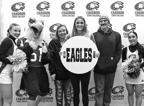 Photo by Tena L. Cook, CSC Chadron State College cheer team members and CSC mascot Elmo pose with a prospective student and her family Feb. 2, 2024, at Eagle Experience Day in the Student Center.
