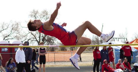 Sophomore Daniel Martins elevates over the bar in the High Jump in Bayard. Photo by Scott Bidroski