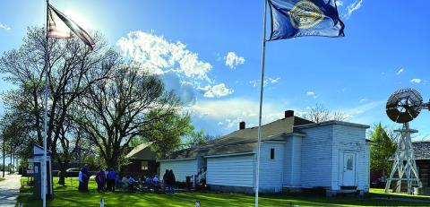 Photo by Heidi Beguin A crowd begins to gather at the Rushville Armstrong House Museum on May 17 for a ground breaking ceremony. After a long road of fundraising, the History Center addition has begun.