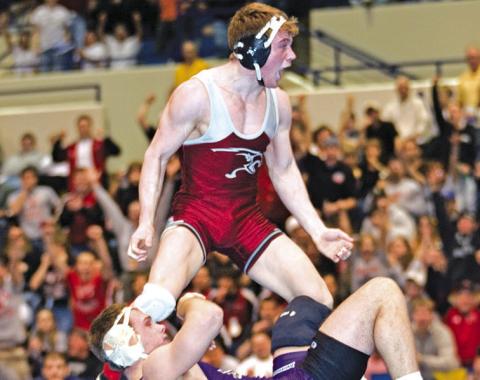 Courtesy Photo Then a senior at Chadron State College, Rushville native Brett Hunter had reason to celebrate when this photo was taken. He had just won his second NCAA Division II National Wrestling Tournament championship by edging Marty Usman of Nebraska-Kearney 3-2 for the 174-pound title. Hunter finished his college career with a 133-32 record.