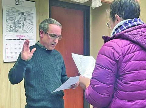 Journal Star Photo Glenn Muhr, pictured above being sworn in as Hay Springs Mayor on Monday, December 19, 2022, has officially resigned. Keith Kearns was chosen as an interim replacement following the official resignation date of April 1, 2024.