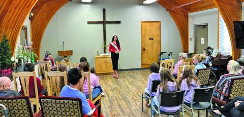 (Photo by Scott Bidroski) Miss USA Audrey Eckert visited Gordon Countryside Care on Friday, December 26. Eckert signed autographs, detailed her recent busy life with her crown, and answered questions from the 50 plus people who attended the event.