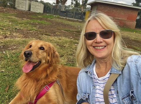 (Courtesy Photo) Lori Selna is pictured with her dog Luna who she almost had to rescue from the fire that burned her home to the ground.