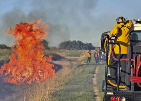 Courtesy Photo Earlier this month, the Hay Springs Volunteer Fire Department oversaw the burning of tumbleweeds in a water canal south of Hay Springs. This volunteer group, which does so much for the community, is being honored at the 2024 Friendly Festival as the Grand Marshal.