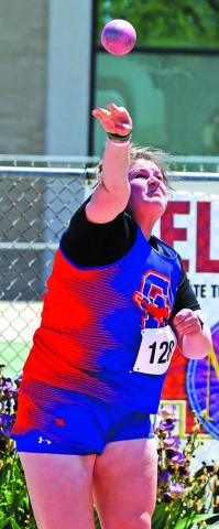 Photo by Melissa Grover Senior McKinley Grover heaves the steel towards the 40 foot mark to pick up her second medal of the weekend in the Shot Put. Grover would mark a personal best 40-02.50 to earn fourth place and her second medal.