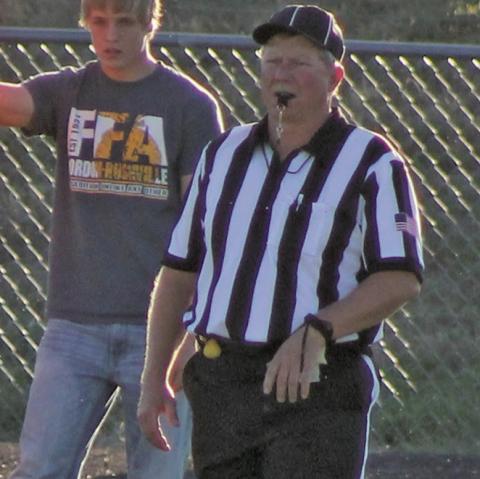 Photo by Heidi Beguin Rushville resident Rex Beguin works a game recently for Gordon-Rushville Public Schools. Beguin has put the cap on an amazing 40 year career officiating football across multiple levels.