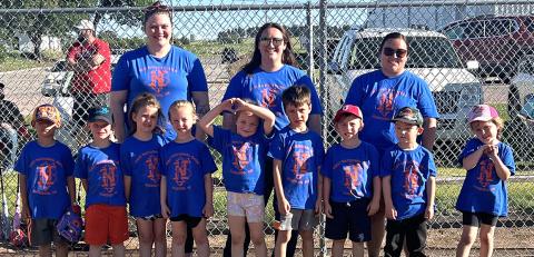 First National Bank Gordon T-Ball Team. Front row: (L-R) Patrick Montenez-Rodriguez, Connor Peters, Presley Wolkins, Lil Takubov, Milo Wolkins, Dean Child, Gage Puncochar. Back row: (L-R) Coaches Angela Clark, Shelby Reynolds, and Courtney Puncochar. Courtesy Photo