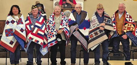 Photo by Kathy Dye On Saturday, October 12, six Veterans were honored with a Quilt of Valor for their service in the military branches. Those honored on the day were: (L-R) Lynette Kills Black, Jim Landreth, Fred Cano, David Roth, Jack Bermingham, and Jerry Janssen.