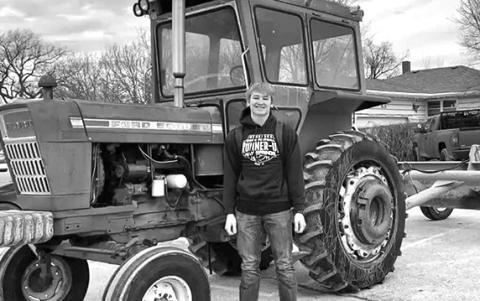 Courtesy Photo Hay Springs junior Dylan Young drove his tractor to school in celebration of National FFA Week.