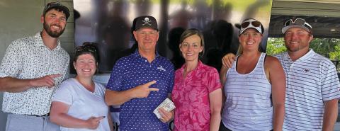 (Courtesy Photo) The winners from the Couples Division. Kyle and Jacoby Anderson (left) finished in first place.