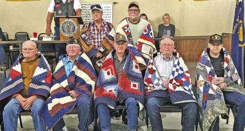 Courtesy Photo During a ceremony held at the Gordon American Legion Post #34 on Sunday, June 29, seven men were honored for their service in the military by receiving a Quilt of Valor. Those Veterans included: Back row (L-R) William Bell (Air Force) and Howard Link (Army). Front row (L-R) Rod Furman (Army), George Vandeveer (Navy), Keith Dorsey (Army), Fred Hlava (Army), and Tom Tuchek (Army).