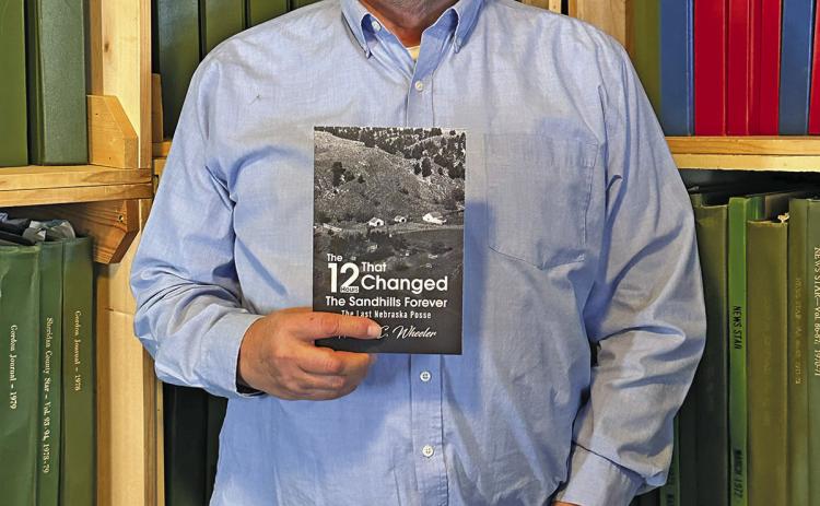(Photo by Scott Bidroski) Gordon native Harlen Wheeler spent numerous years researching the tragic events of 1952 leading up to the killing of Blaine Ellis. In his new book, “The 12 Hours That Changed The Sandhills Forever,” Wheeler reveals an in-depth account of the man who carried out multiple murders, and the local posse that brought it all to an end.